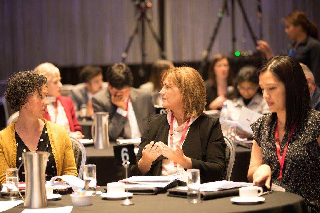 Conference speaker presenting